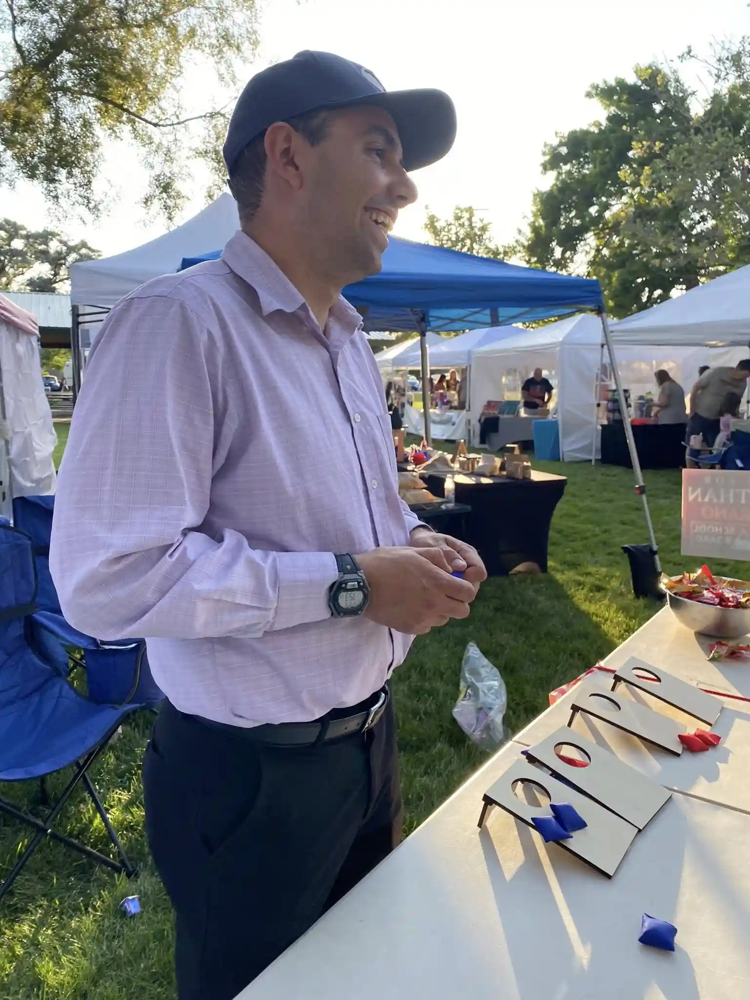Jonathan Bejarano engaging with community members at the Highland Farmers Market