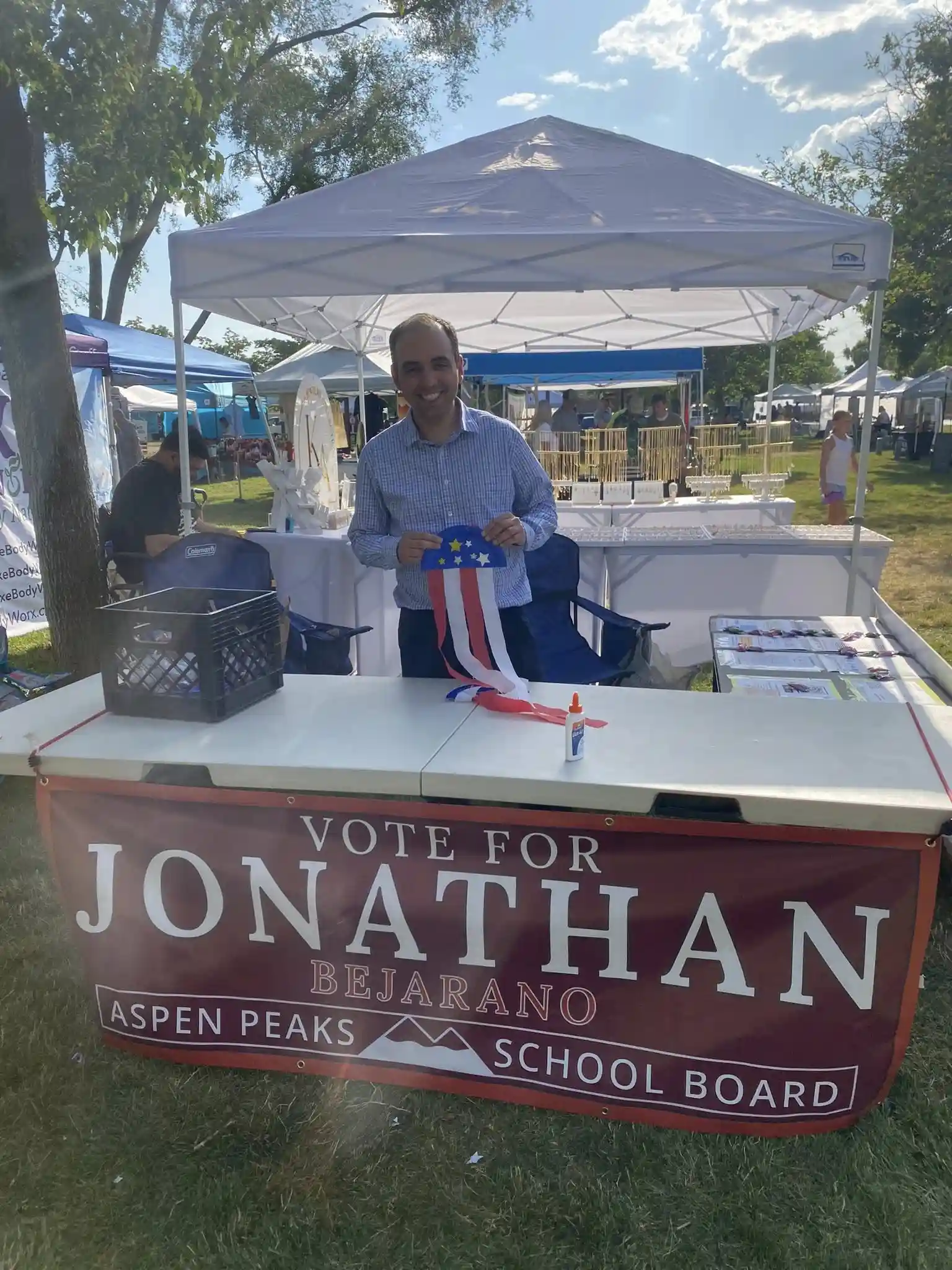 Jonathan Bejarano at Highland Farmers Market connecting with community members